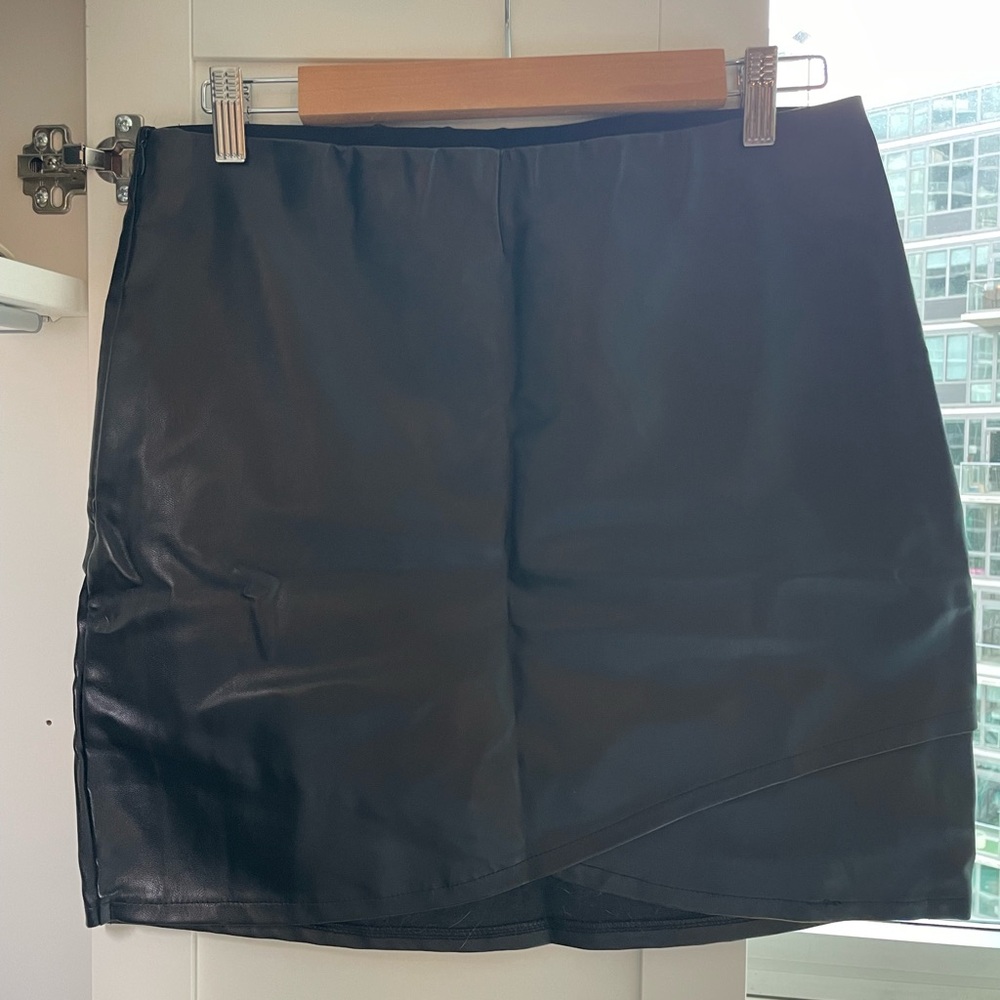 BISHOP & YOUNG leather cross mini skirt